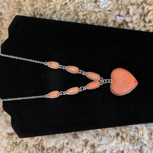 Pink heart pendant necklace